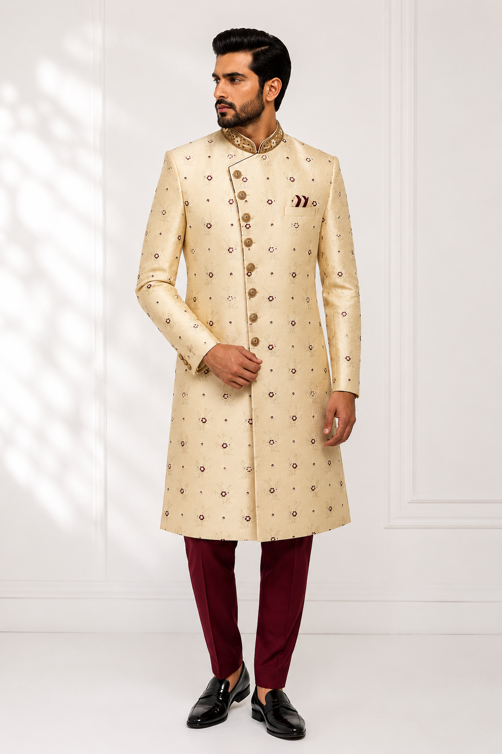 Ivory floral sherwani for men with ornate collar and decorative buttons