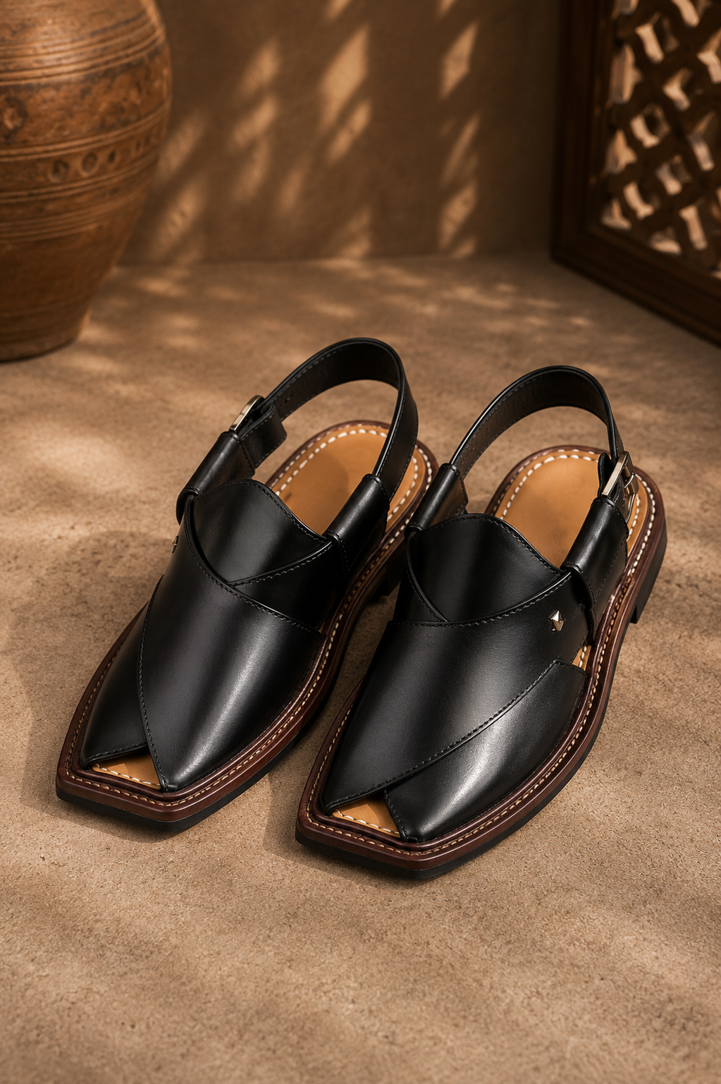 Men's black Peshawari chappal with traditional Pakistani design